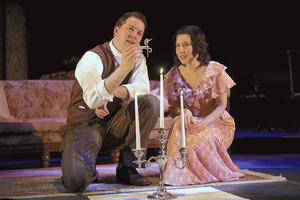 Michael Kirby (as The Gentleman Caller) and Adriana Gaviria (as Laura) in the Syracuse Stage production of The Glass Menagerie.