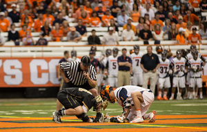 Chris Daddio squares up for a faceoff with Bryant's Kevin Massa, the leading specialist in the country. Daddio won a respectable 9-of-23 draws against Massa, but not enough.