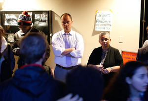 Gabe Nugent, associate general counsel for SU, and Bea Gonzalez, University College dean, talk with protesters on Nov. 7 about rules for staying over the weekend. Protesters are now in their second weekend of the sit-in.