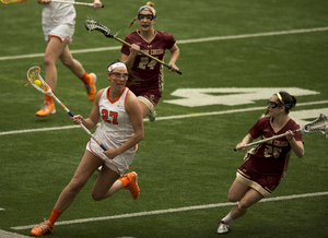 Syracuse midfielder Kelly Cross, who was the driver of the car that crashed into the Mount Olympus stairwell Monday morning, has been suspended indefinitely due to a violation of team rules, SU Athletics confirmed Friday shortly after noon.