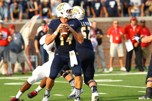 Jacob Huesman has played under center for the Mocs for three seasons under his father, head coach Russ Huesman.