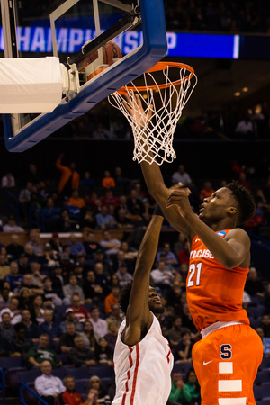 Tyler Roberson collected 18 boards, scored 10 boards and helped lead Syracuse in its win against Dayton on Friday. 