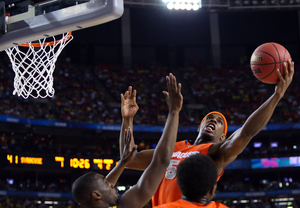 C.J. Fair puts the ball up to the basket against the Michigan Wolverines during the Final Four of the 2013 NCAA Men's Basketball Tournament.