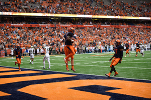 Our beat writers think Syracuse will make it back to .500 with a win over the Huskies. 