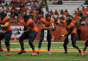 Eric Dungey thrived in his first real test in the Dino Babers offense, setting career highs in passing yards and completions.