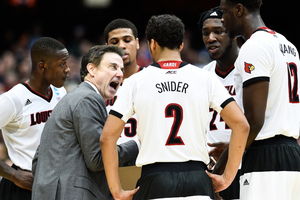 Since 2001, Rick Pitino has led strong Louisville teams. This year, he'll lead another into the Carrier Dome on Monday night. 