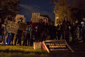 Students marched from campus, through Walnut Park, to the Planned Parenthood Health Center off East Genesee Street at about 6:30 p.m. to counterprotest an anti-abortion 