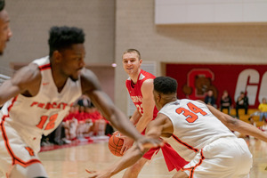 Through four games, Josh Warren is leading Cornell in both assists and rebounds per game.