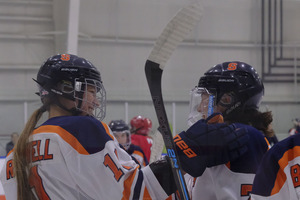 Kelli Rowswell (left) tallied her 50th and 51st points this season in Syracuse's win on Saturday afternoon.