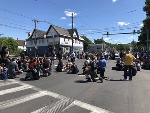 The demonstrations have been largely peaceful with the exception of the breaking of a courthouse window and looting of stores on May 30.