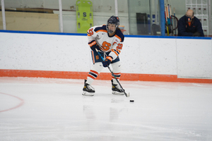 Defenseman Jessica DiGirolamo scored in her third straight game in Syracuse's overtime win.