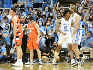 Caleb Love hit several clutch shots for North Carolina, sending Syracuse to its third straight loss. 