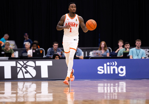 In his debut game with Boeheim's Army, Dee Bost led the team in scoring with 18 points.