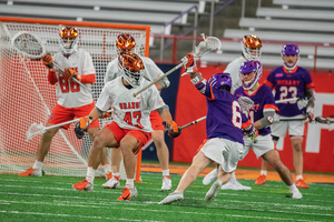 Syracuse's defense struggled during its 19-12 loss to No. 4 Virginia, especially with faceoffs and stopping the 3-on-3.