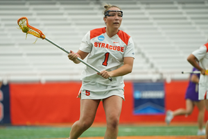 Olivia Adamson boosted the Orange to a 13-7 win against James Madison in the NCAA Tournament quarterfinals.