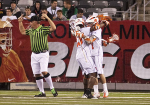 Tim Desko (right) celebrates a goal with Jovan Miller in Syracuses 13-4 blowout of Princeton at the Big City Classic Saturday. The game was one of three that opened New Meadowlands Stadium.