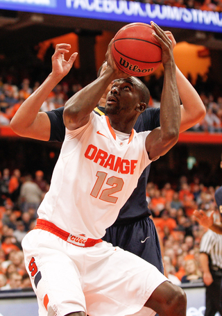 Syracuse forward Baye Moussa Keita attempts a shot.