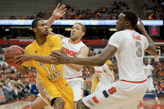 (From left) Brandon Triche and Jerami Grant double team and force Alcorn State's Anthony Nieves to get rid of the ball.