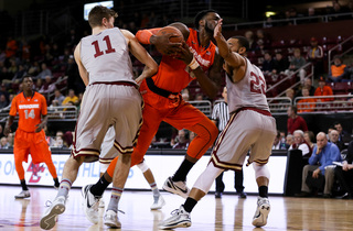 Christmas fights through a double team from BC's Will Magarity and Olivier Hanlan and tries to get to the rim.