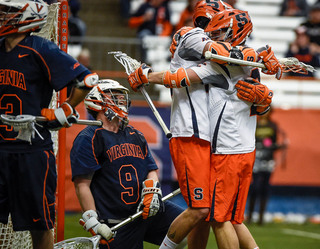 Kevin Rice embraces after a goal. Rice had three goals on the afternoon. 