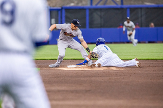 Wilfredo Tovar slides in safe under the throw at second.